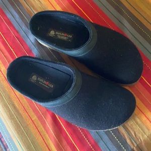 Men’s Haflinger boiled wool black slip-ons.